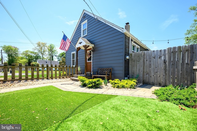 282 Eaton Ave, Hamilton, NJ 08619 - rear view of house featuring a chimney