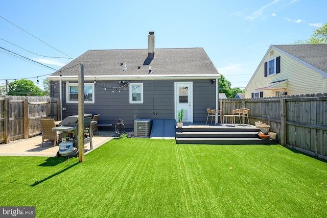 282 Eaton Ave, Hamilton, NJ 08619 - rear view of property featuring a deck, central AC, a chimney, a patio, and a shingled roof