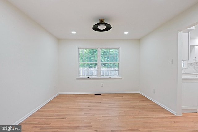 2144 Silentree Dr, Vienna, VA 22182 - unfurnished room featuring light wood finished floors and recessed lighting