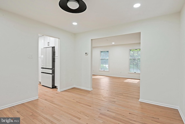 2144 Silentree Dr, Vienna, VA 22182 - spare room with light wood-type flooring and recessed lighting