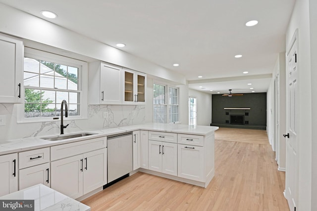 2144 Silentree Dr, Vienna, VA 22182 - kitchen featuring dishwasher, a peninsula, light wood-style flooring, white cabinets, and recessed lighting