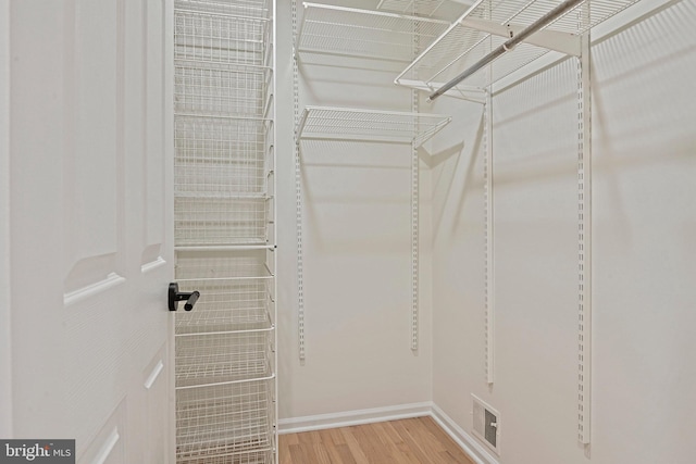 2144 Silentree Dr, Vienna, VA 22182 - spacious closet with light wood finished floors