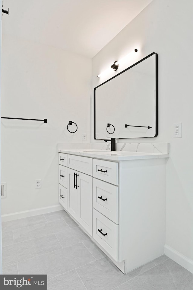 2144 Silentree Dr, Vienna, VA 22182 - bathroom featuring double vanity and baseboards