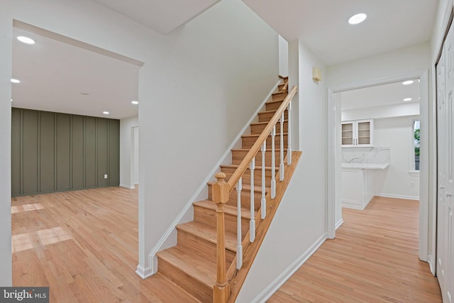 2144 Silentree Dr, Vienna, VA 22182 - stairs featuring wood finished floors and recessed lighting