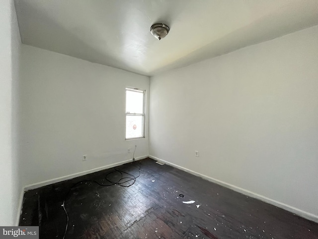 2742 W Mosher St, Baltimore, MD 21216 - empty room featuring baseboards and dark wood finished floors