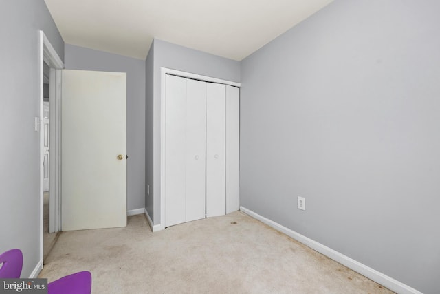 4439 Starling Ct, Woodbridge, VA 22193 - unfurnished bedroom featuring a closet, carpet, and baseboards