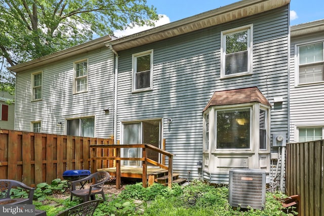 4439 Starling Ct, Woodbridge, VA 22193 - back of house with central air condition unit