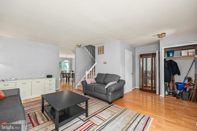4439 Starling Ct, Woodbridge, VA 22193 - living room with stairs and light wood-type flooring