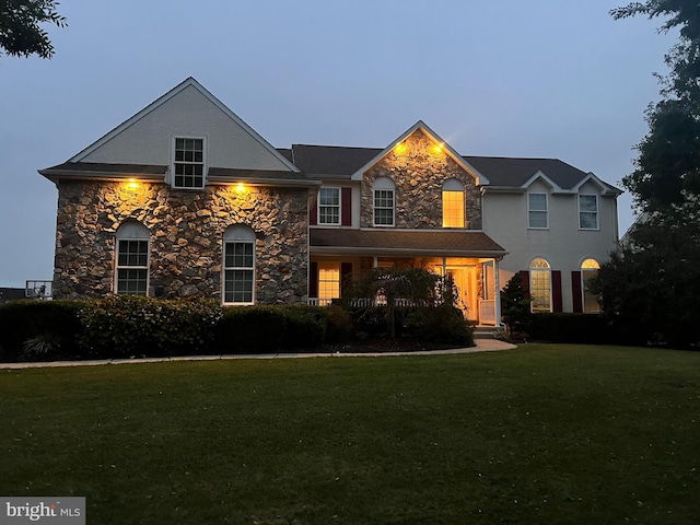 114 Saint Augustine Ct, Middletown, DE 19709 - view of front facade with stone siding and a front yard