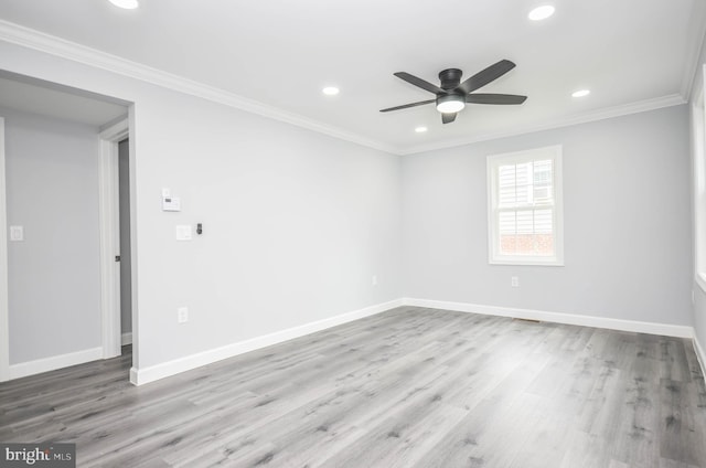 4915 78th Ave, Hyattsville, MD 20784 - empty room featuring wood finished floors, a ceiling fan, recessed lighting, baseboards, and ornamental molding