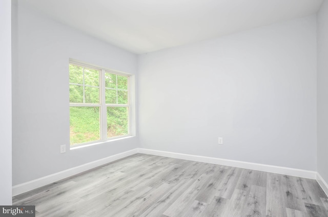 4915 78th Ave, Hyattsville, MD 20784 - empty room featuring baseboards and wood finished floors
