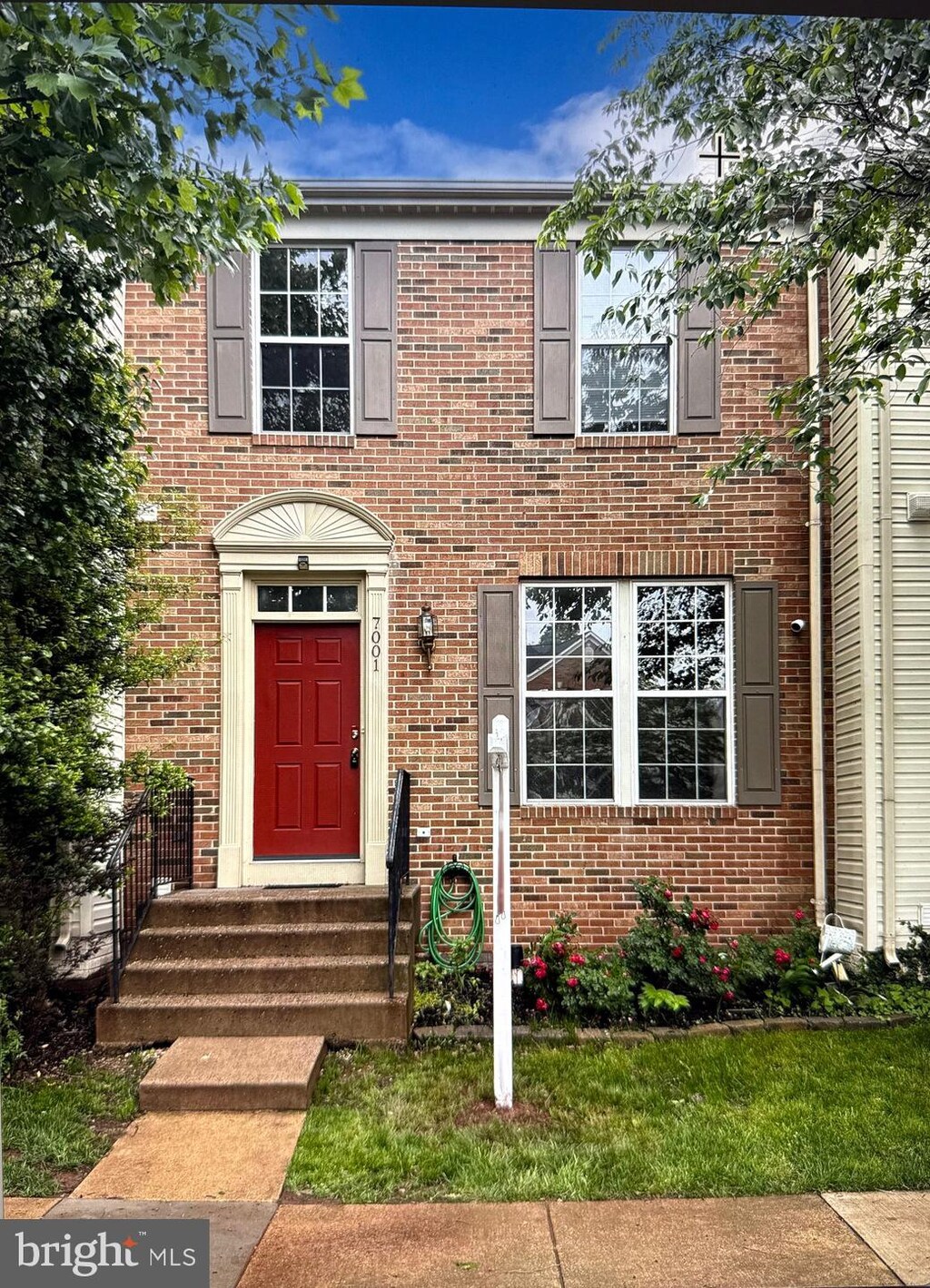 7001 Manahoac Pl, Gainesville, VA 20155 - view of front of home with brick siding