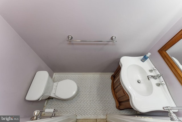 bathroom with a sink and toilet