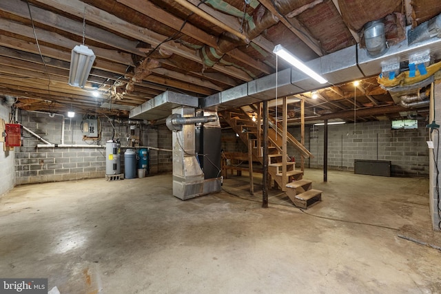 unfinished basement featuring water heater, stairs, heating unit, and electric panel