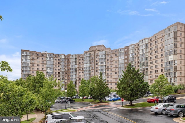 19355 Cypress Ridge Ter Unit 414, Leesburg, VA 20176 - view of apartment building / complex with uncovered parking