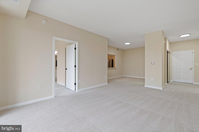 19355 Cypress Ridge Ter Unit 414, Leesburg, VA 20176 - unfurnished room with light carpet, baseboards, and a smoke detector