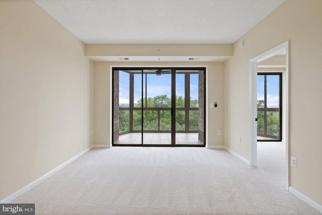 19355 Cypress Ridge Ter Unit 414, Leesburg, VA 20176 - carpeted spare room featuring baseboards and healthy amount of natural light