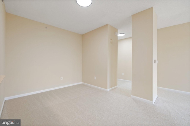 19355 Cypress Ridge Ter Unit 414, Leesburg, VA 20176 - unfurnished room featuring light carpet and baseboards