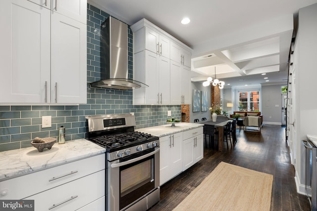 823 11th St NE, Washington, DC 20002 - kitchen featuring stainless steel gas range, wall chimney exhaust hood, recessed lighting, white cabinetry, and dark wood-type flooring
