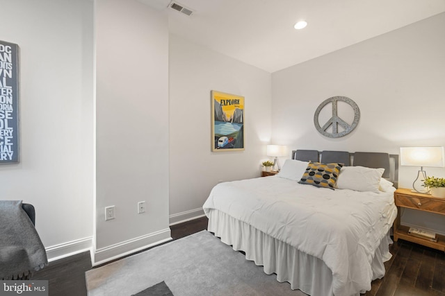 823 11th St NE, Washington, DC 20002 - bedroom with wood finished floors, baseboards, and recessed lighting