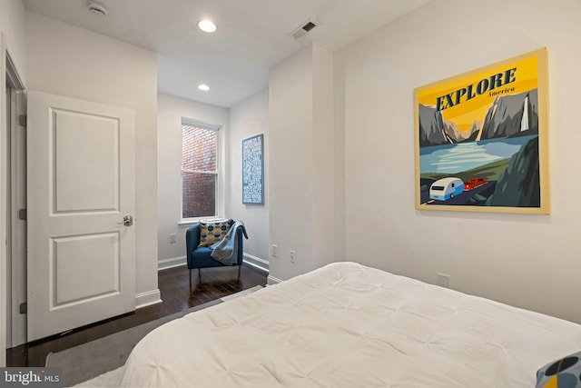 823 11th St NE, Washington, DC 20002 - bedroom with wood finished floors, recessed lighting, and baseboards