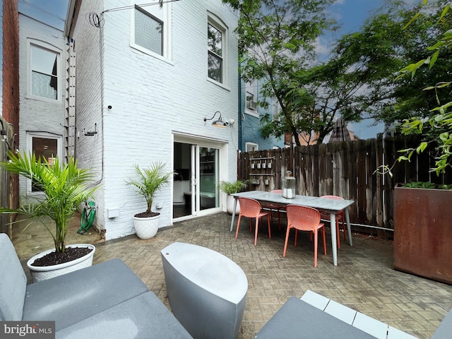 823 11th St NE, Washington, DC 20002 - view of patio with outdoor dining area and fence