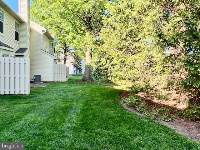 view of yard featuring central AC unit