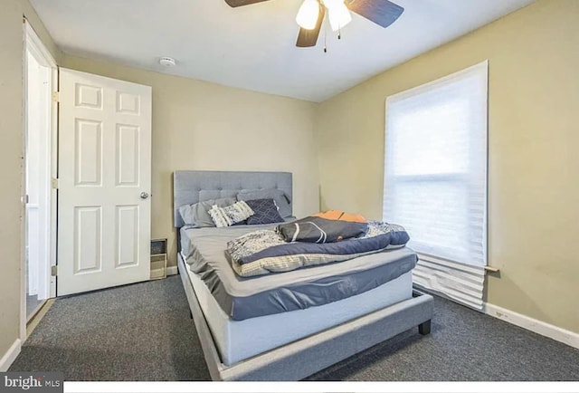 840 S 2nd St, Millville, NJ 08332 - carpeted bedroom with baseboards and a ceiling fan