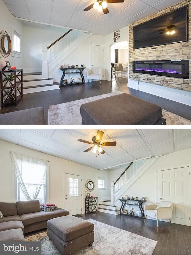840 S 2nd St, Millville, NJ 08332 - living area featuring ceiling fan, stairs, wood finished floors, a stone fireplace, and healthy amount of natural light