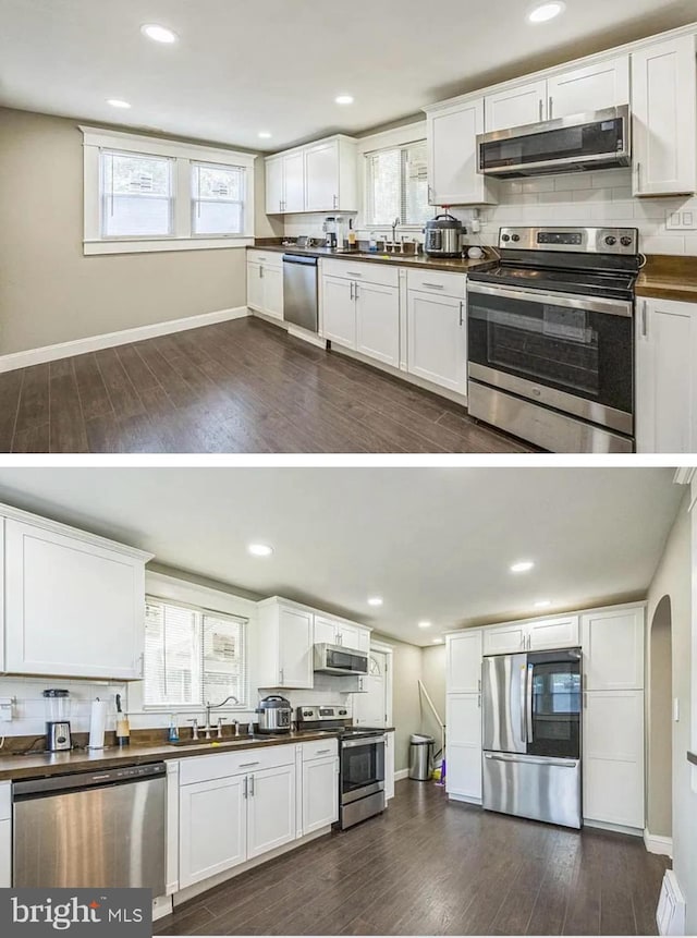840 S 2nd St, Millville, NJ 08332 - kitchen featuring appliances with stainless steel finishes, dark countertops, dark wood finished floors, a sink, and white cabinets