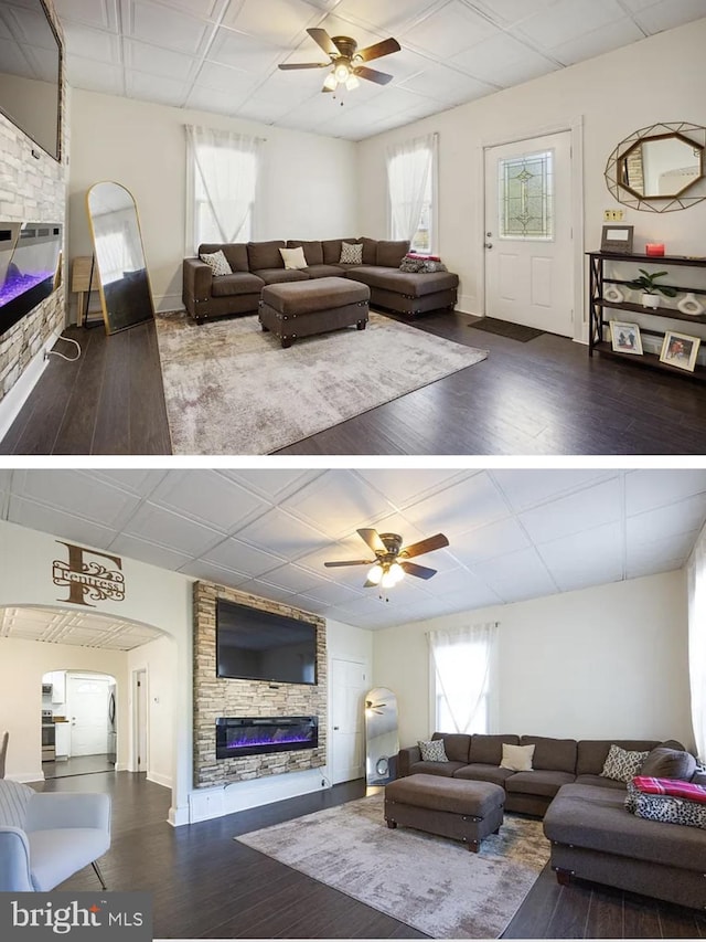 840 S 2nd St, Millville, NJ 08332 - living room with a stone fireplace, a ceiling fan, wood finished floors, and healthy amount of natural light