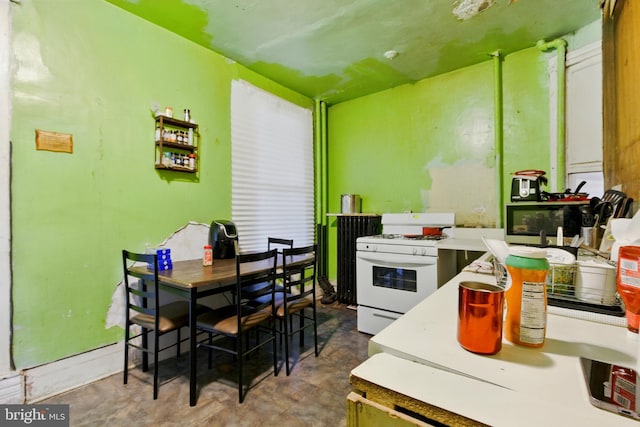 1625 6th St NW, Washington, DC 20001 - kitchen featuring white gas range oven and light countertops