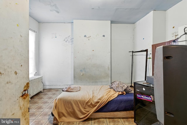 1625 6th St NW, Washington, DC 20001 - bedroom with radiator heating unit and tile patterned flooring