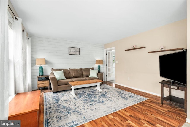 105 Bachtell Cir, Smithsburg, MD 21783 - living area with wood finished floors, baseboards, and wooden walls