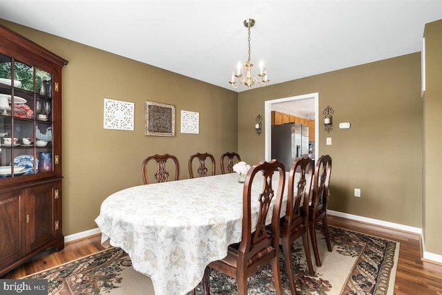 105 Bachtell Cir, Smithsburg, MD 21783 - dining space with a chandelier, wood finished floors, and baseboards