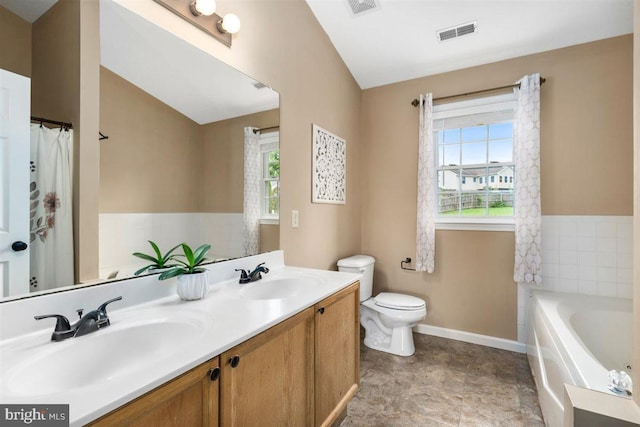 105 Bachtell Cir, Smithsburg, MD 21783 - full bath featuring toilet, a bath, double vanity, baseboards, and lofted ceiling