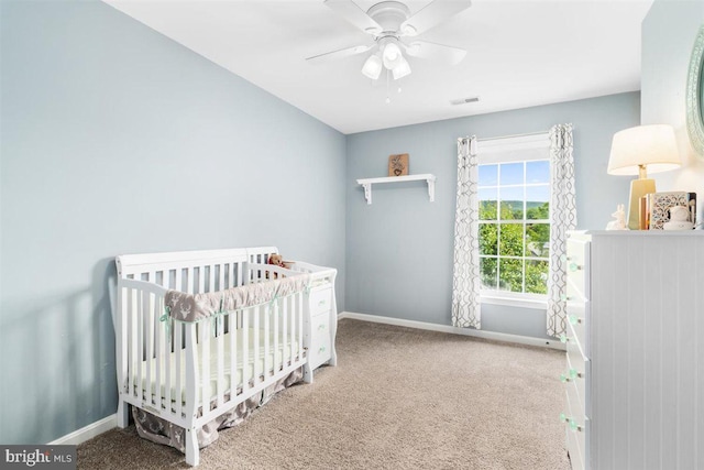 105 Bachtell Cir, Smithsburg, MD 21783 - carpeted bedroom featuring baseboards, a crib, and a ceiling fan