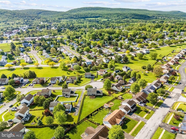 105 Bachtell Cir, Smithsburg, MD 21783 - aerial view of residential area with a mountain backdrop and a forest