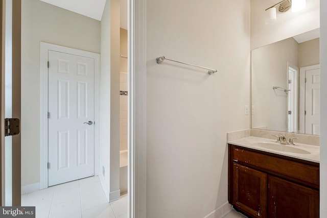 42506 Black Talon Ct, Leesburg, VA 20176 - bathroom with vanity, tile patterned floors, and baseboards