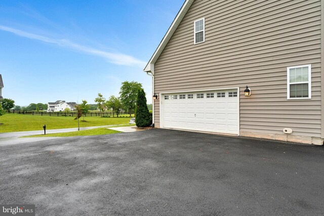 42506 Black Talon Ct, Leesburg, VA 20176 - garage with asphalt driveway
