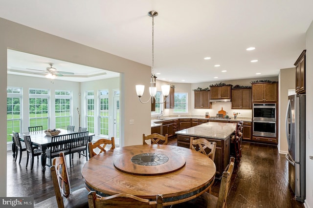42506 Black Talon Ct, Leesburg, VA 20176 - dining space with recessed lighting, dark wood-type flooring, and a ceiling fan