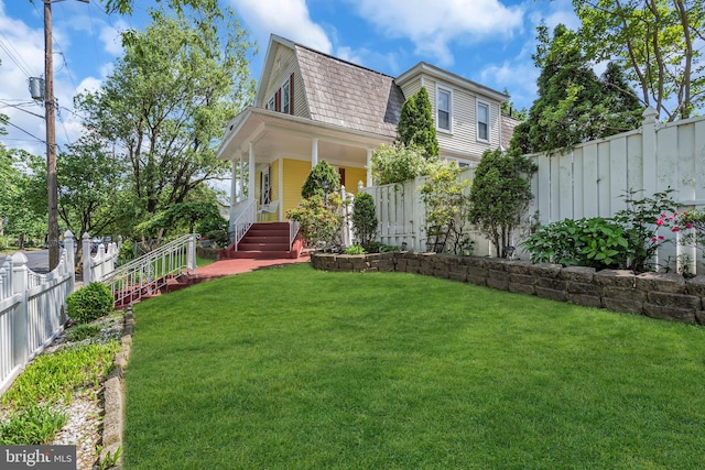 view of yard with a porch