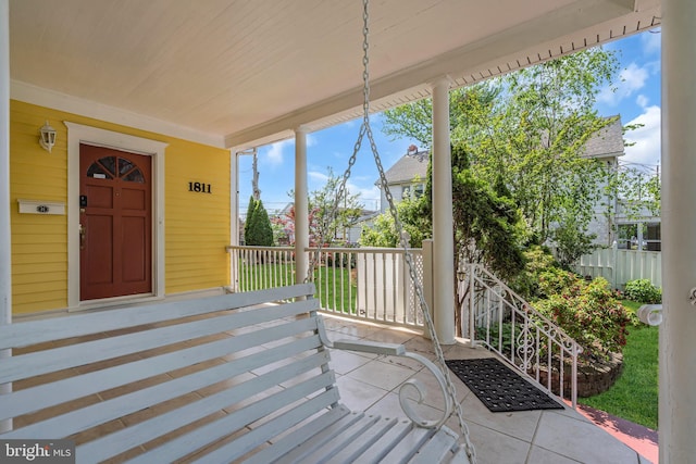 wooden terrace with covered porch