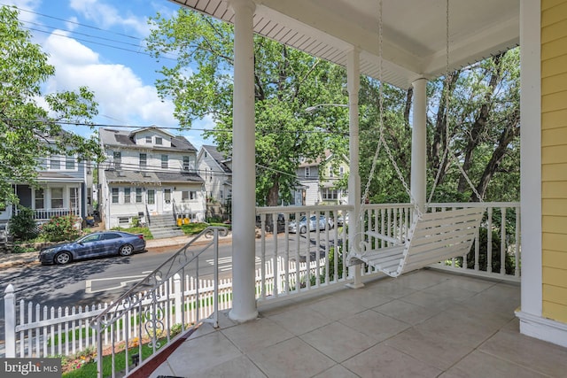 balcony featuring a residential view