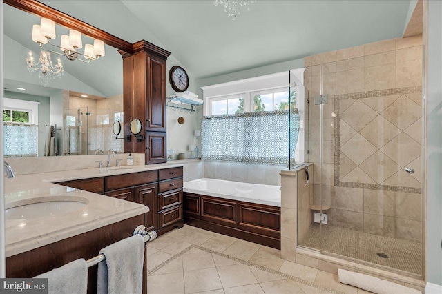 bathroom featuring a shower stall, a bath, tile patterned floors, vanity, and a chandelier