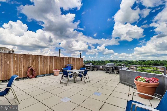 1001 N Vermont St Unit 403, Arlington, VA 22201 - view of patio / terrace featuring outdoor dining space and a grill