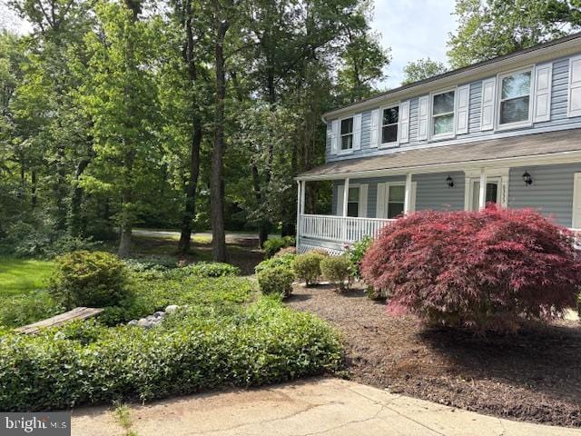 view of home's exterior with covered porch