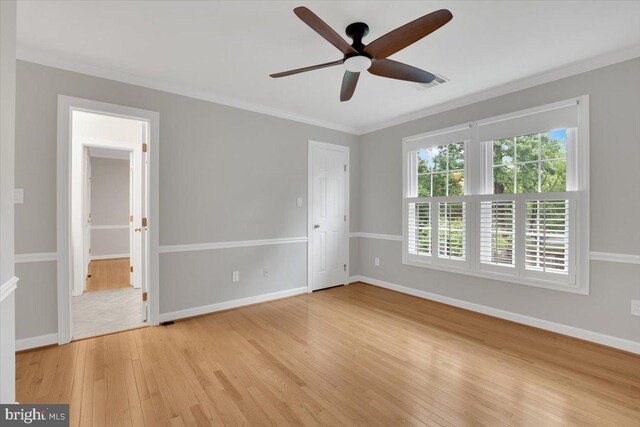 6014 Marilyn Dr, Alexandria, VA 22310 - spare room with light wood-style flooring, crown molding, a ceiling fan, and baseboards