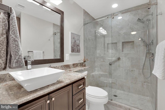 6014 Marilyn Dr, Alexandria, VA 22310 - full bath featuring a stall shower, vanity, toilet, and recessed lighting