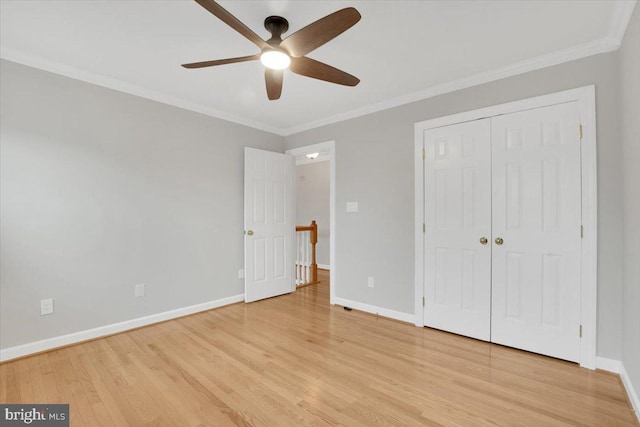 6014 Marilyn Dr, Alexandria, VA 22310 - unfurnished bedroom featuring light wood-style flooring, baseboards, ornamental molding, a closet, and a ceiling fan